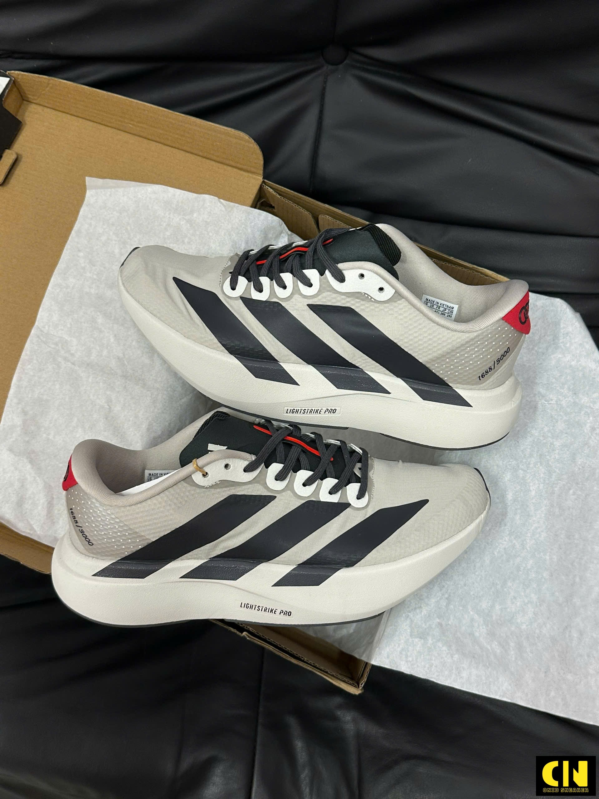 Giày Adidas Adizero Evo Sl Woven Audi Revolut F1 Team Chalk Pearl Giày Adidas Adizero Evo SL Woven Audi Revolut F1 Team Chalk Pearl