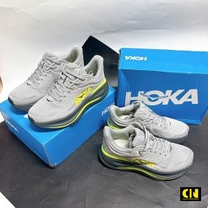 Giay Hoka Bondi 9 Mau Xam Stardust De Vien Vang Neon Giày Hoka Bondi 9 Màu Xám Stardust Đế Viền Vàng Neon